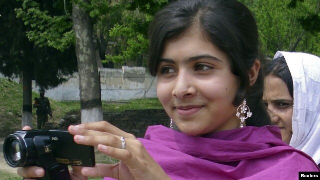 Malala Yousufzai, a 14-year-old schoolgirl, who was wounded in a gun attack, is seen in Swat Valley, northwest Pakistan, in this undated file photo.
