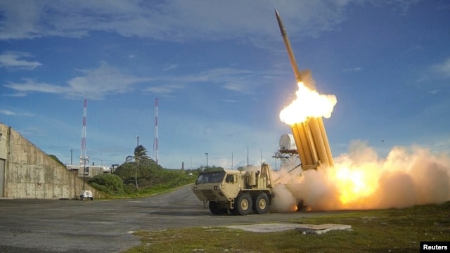 FILE - A Terminal High Altitude Area Defense (THAAD) interceptor is launched during a successful intercept test, in this undated handout photo provided by the U.S. Department of Defense.