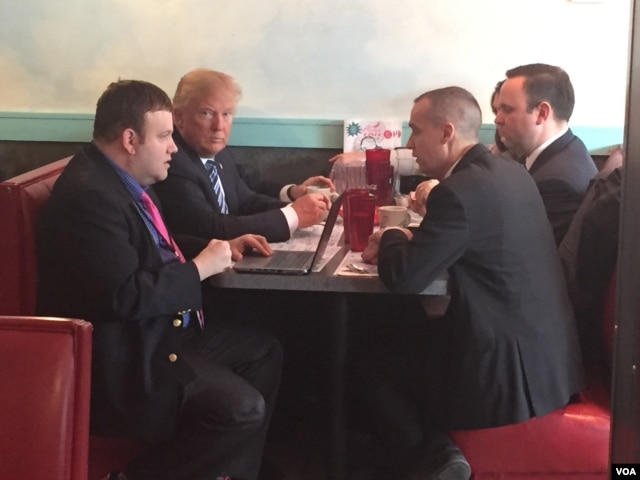 Donald Trump eats breakfast at the Airport Diner in Manchester, NH on the morning of the primary, Feb. 6, 2016. (Photo: K. Gypson/VOA)