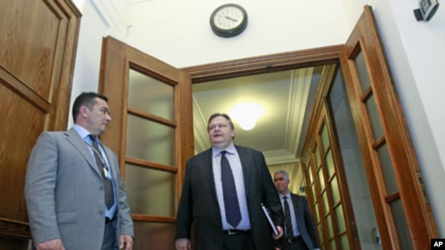 Greece's Finance Minister Evangelos Venizelos arrives for a cabinet meeting at the parliament in Athens, Greece, March 8, 2012.