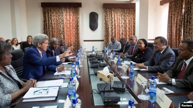 U.S. Secretary of State John Kerry (2nd L) participates in a meeting with Ethiopian Minister of Foreign Affairs Tedros Adhanom (2nd R), Kenyan Foreign Minister Amina Mohamed (3rd R) and Ugandan Foreign Affairs Minister Sam Kutesa (R) in Addis Ababa, May 1