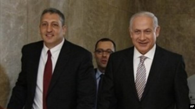 Israeli Prime Minister Benjamin Netanyahu, right, arrives to attend a cabinet meeting at his office in Jerusalem to rubber stamp the creation of an "independent public commission,"  to probe Israel's deadly naval raid on a Gaza-bound aid flotilla last mon