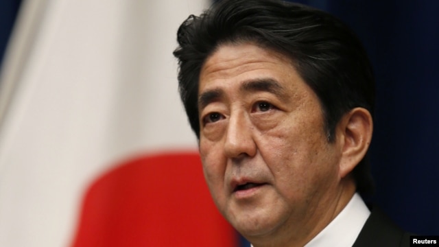 Japan's new Prime Minister Shinzo Abe attends a news conference at his official residence in Tokyo, December 26, 2012.