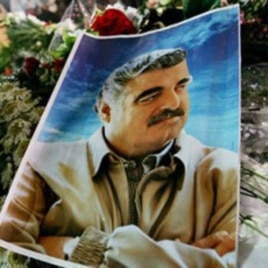 A photo of slain Lebanese former Prime Minister Rafiq Hariri is seen on his grave at Martyr's Square, central Beirut, Lebanon, 03 Mar 2005
