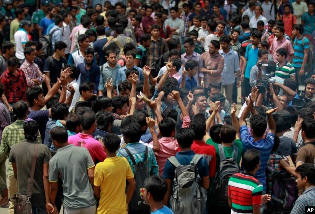 Students protest seeking the arrest of three motorcycle-riding assailants who hacked and shot student activist Nazimuddin Samad to death as he walked with a friend, in Dhaka, Bangladesh, April 7, 2016.