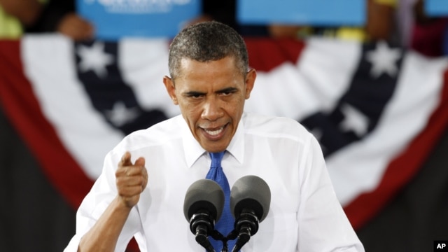 President Barack Obama gestures during a rally in Virginia Beach, Virginia, September 27, 2012.