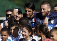 Gianluigi Buffon and Daniele De Rossi of Italy.
