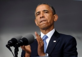 President Barack Obama applauds those who serve in Iraq and Afghanistan as he deliverers the commencement address to the U.S. Military Academy at West Point's Class of 2014, in West Point, N.Y., May 28, 2014.