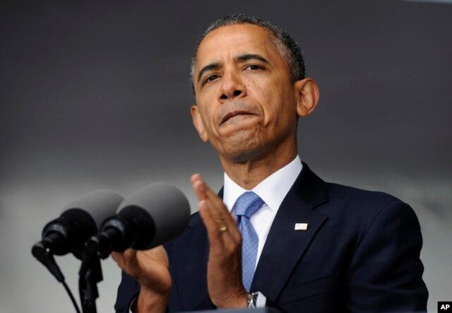 President Barack Obama applauds those who serve in Iraq and Afghanistan as he deliverers the commencement address to the U.S. Military Academy at West Point's Class of 2014, in West Point, N.Y., May 28, 2014.