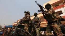 Central African Republic soldiers in President Francois Bozize's convoy brandish weapons, Bangui, Jan. 10, 2013.