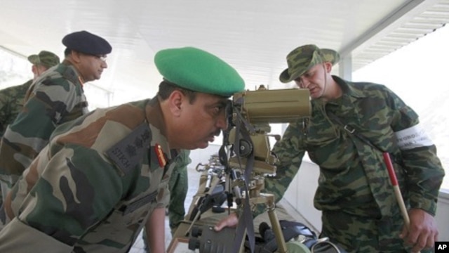 An Indian army officer looks through binoculars during a visit to a range outside the Russian city of Vladikavkaz (2010 file photo)