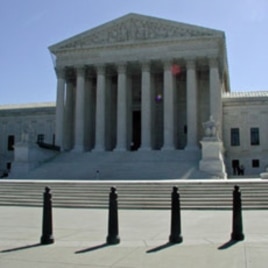 Ballards help protect the entrance of the Supreme Court, 07 May 2010