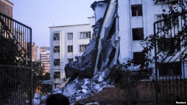 Tòa nhà bị sụp đổ sau các vụ nổ bom ở Liễu Châu, Quảng Tây, Trung Quốc, ngày 30/9/2015.