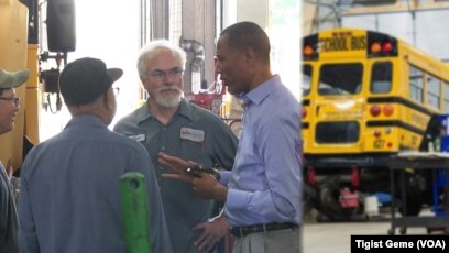 Tashitaa Tufaa chats with mechanics and drivers at Metropolitan Transportation Network’s maintenance shop in Fridley, Minnesota, Aug. 10, 2017.