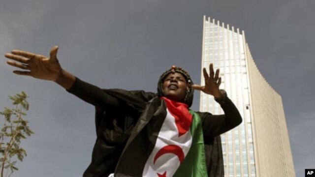 A traditional dancer performs during the inauguration of the new African Union headquaters in Ethiopia's capital Addis Ababa, January 28, 2012.