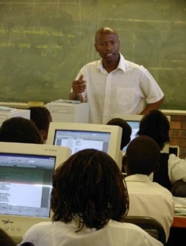 Students listen to ICT instruction at KwaMhlanga High School in Mpumalanga, South Africa.