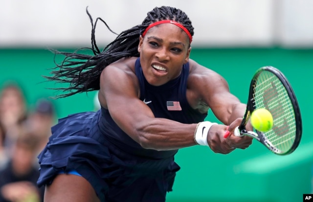 Rio Olympics Tennis: Serena Williams, of the United States, reaches for a return against Daria Gavrilova, of Australia, at the 2016 Summer Olympics in Rio de Janeiro, Brazil, Sunday, Aug. 7, 2016.