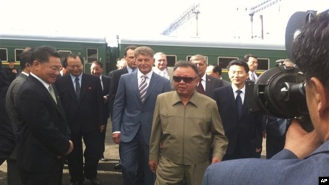 North Korean leader Kim Jong-il takes part in a welcoming ceremony on his arrival in Novoburesky in Amur province, August 21, 2011.