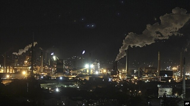 Smoke bellows out of chimney stacks at BlueScope Steel's steelworks at Port Kembla, south of Sydney, Australia (File). 