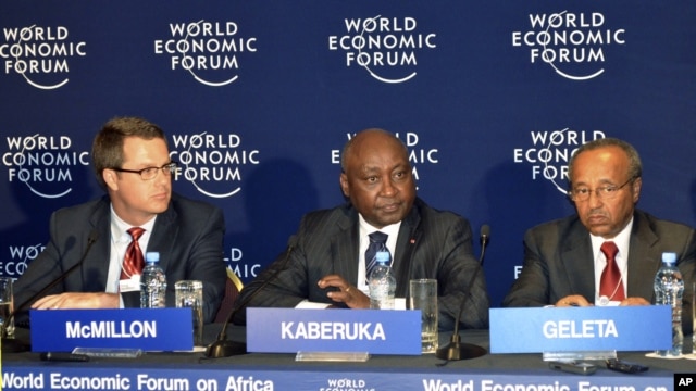 Donald Kaberuka (C) with Doug McMillon (L), Bekele Geleta at Economic Forum on Africa, in Addis Ababa, May 10, 2012.
