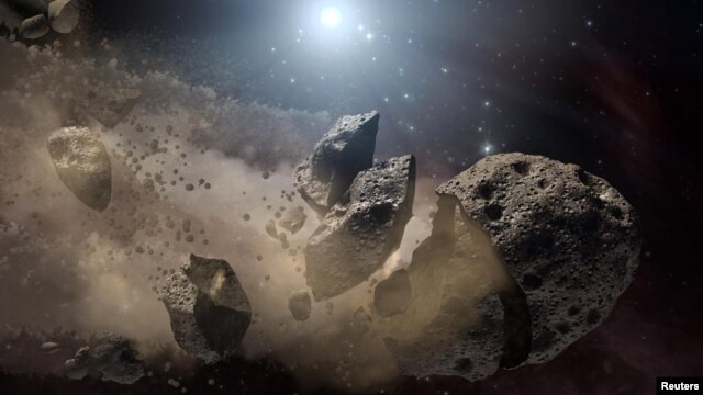 Image courtesy of NASA shows an artist's concept of a broken-up asteroid. Scientists think that a giant asteroid, which broke up long ago in the main asteroid belt between Mars and Jupiter, eventually made its way to Earth and led to the extinction of the dinosaurs.