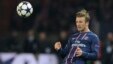 Paris St Germain's David Beckham reacts during their Champions League quarter-final first leg soccer match against Barcelona at the Parc des Princes Stadium in Paris, France, April 2, 2013.   