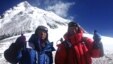 In this May 22, 2013 photo distributed by Miura Dolphins Co. Ltd., 80-year-old Japanese extreme skier Yuichiro Miura, right, and his son, Gota pose at their South Col camp at 8,000 meters (26,247 feet) before their departure for Camp 5.
