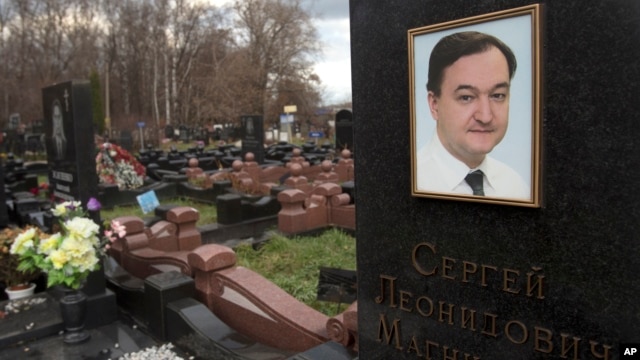 A tombstone on the grave of lawyer Sergei Magnitsky who died in jail, at a cemetery in Moscow, November 16, 2012.