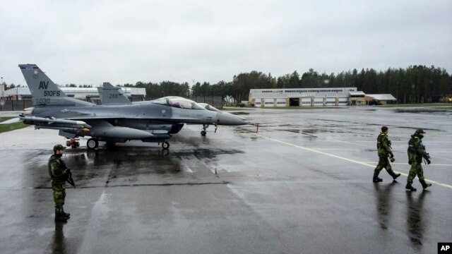 U.S. fighter planes are readied during NATO's Arctic Challenge Exercise at Kallax Airport outside Lulea, Sweden, May 26, 2015.