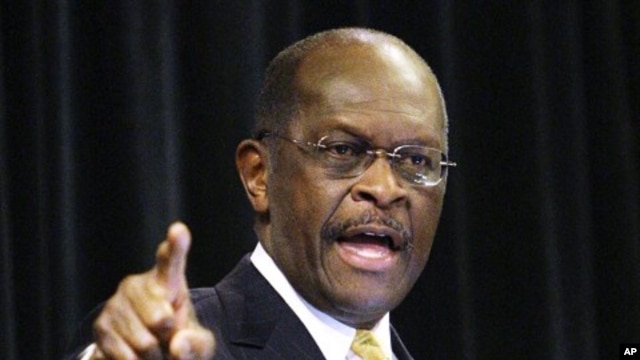 Republican presidential candidate, Herman Cain makes a point during a speech at a campaign rally, in Dayton, Ohio, November 30, 2011.