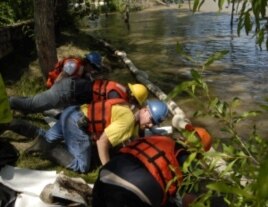 Some 300 workers are beginning cleanup operations, with booms and special materials designed to soak up oil.