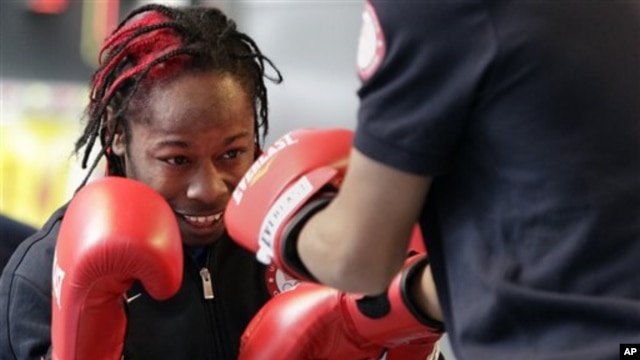Rau'shee Warren gives a demonstration during the U.S. Olympic "Road to London" celebration held in April in New York to mark 100 days until the Olympics