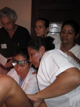 Dr. Art Levit, (left) a PINCC volunteer, supervises doctors during an examination in Jalapa, Nicaragua.