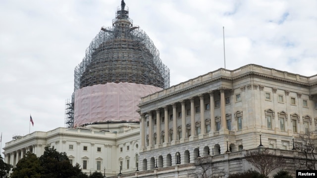 FILE - The U.S. Capitol stands in Washington January 20, 2015. 