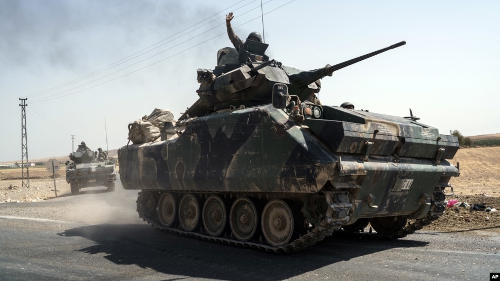 Turkish troops head to the Syrian border, in Karkamis, Turkey, Aug. 27, 2016. Turkey on Wednesday sent tanks across the border to help Syrian rebels retake the key Islamic State-held town of Jarablus and to contain the expansion of Syria's Kurds in an area bordering Turkey.
