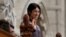 Nadia Murad Basee Taha, U.N. Goodwill Ambassador for the Dignity of Survivors of Human Trafficking, waves while being recognized by the speaker in the House of Commons on Parliament Hill in Ottawa, Ontario, Oct. 25, 2016.