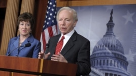 Senate Homeland Security Committee Chairman Sen. Joseph Lieberman, I-Conn., right, speaks during a news conference on Capitol Hill in Washington, December 31, 2012, to discuss the committee's report on the security deficiencies at the temporary U.S. Missi