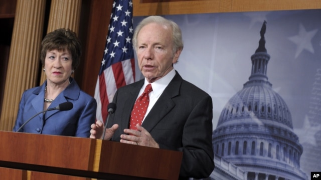 Senate Homeland Security Committee Chairman Sen. Joseph Lieberman, I-Conn., right, speaks during a news conference on Capitol Hill in Washington, December 31, 2012, to discuss the committee's report on the security deficiencies at the temporary U.S. Missi