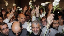 Iranski koje su oslobodili sirijski pobunjenici stigli su u jedan hotel, u Damasku