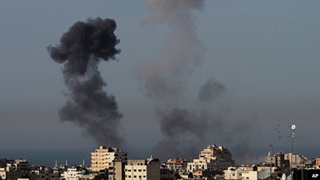 Smoke rises from an explosion following an Israeli airstrike in Gaza City, March 10, 2012.