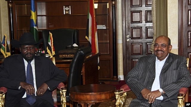 President of the Government of Southern Sudan, Salva Kiir Mayardit, left, with Sudan President Omar al-Bashir in Juba, South Sudan, April 2011.