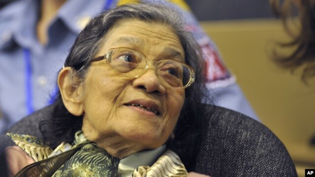 In this photo taken on Oct. 19, 2011 released by the Extraordinary Chambers in the Courts of Cambodia, Ieng Thirith smiles during a hearing in Phnom Penh.