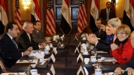 U.S. Secretary of State John Kerry, second from right, meets with members of Egyptian political parties including Ayman Nour, left, in Egypt, March 2, 2013.
