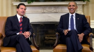 President Barack Obama, right, meets with Mexican President Enrique Pena Nieto in the Oval Office of the White House in Washington, July 22, 2016.