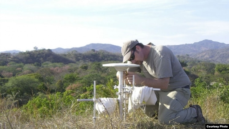 Andrew Newman, an associate professor in the School of Earth and Atmospheric Sciences at the Georgia Institute of Technology, performs a GPS survey in Costa Rica's Nicoya Peninsula in 2010. (Lujia Feng/Georgia Tech).