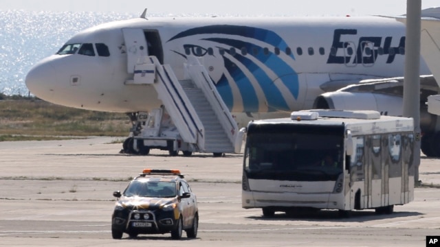 A bus carrying some passengers from the hijacked EgyptAir aircraft as it landed at Larnaca airport, March 29, 2016. 