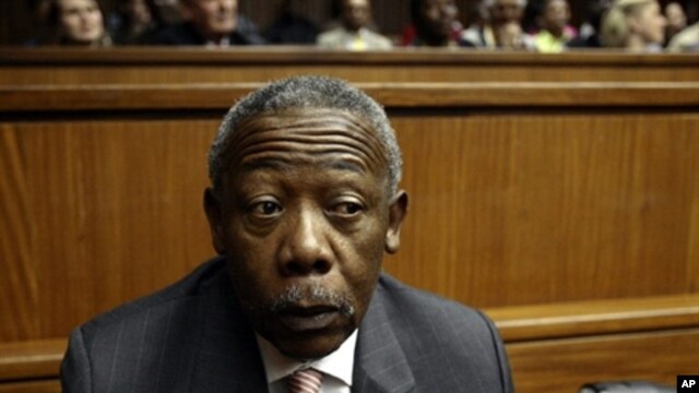 South Africa's former police chief and ex-president of Interpol Jackie Selebi looks on during a hearing at the High Court of Johannesburg, on 3 Aug 2010