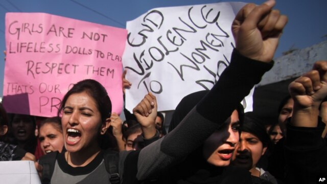 Indian students shout slogans and demand severe punishment for rapists as they condemn the gang-rape of a student in New Delhi during a protest in Jammu, India, December 21, 2012.