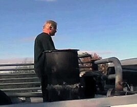Rick Bates mounted a specialized wood burning stove in the bed of his 1969 GMC truck and connected it to the engine.