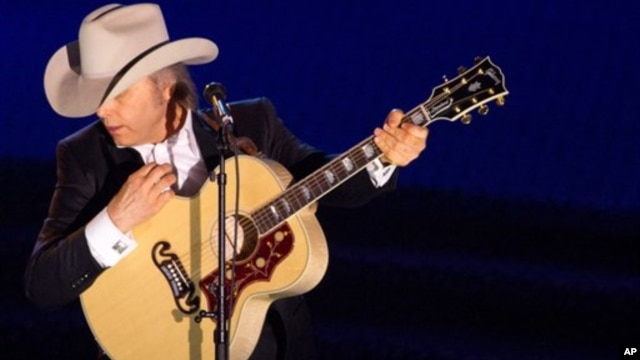 Dwight Yoakam performing at a music awards ceremony in June